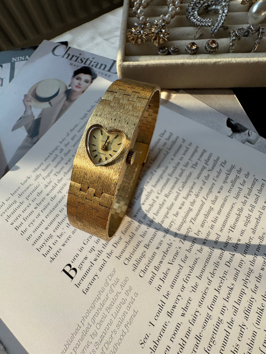 Gold toned heart watch