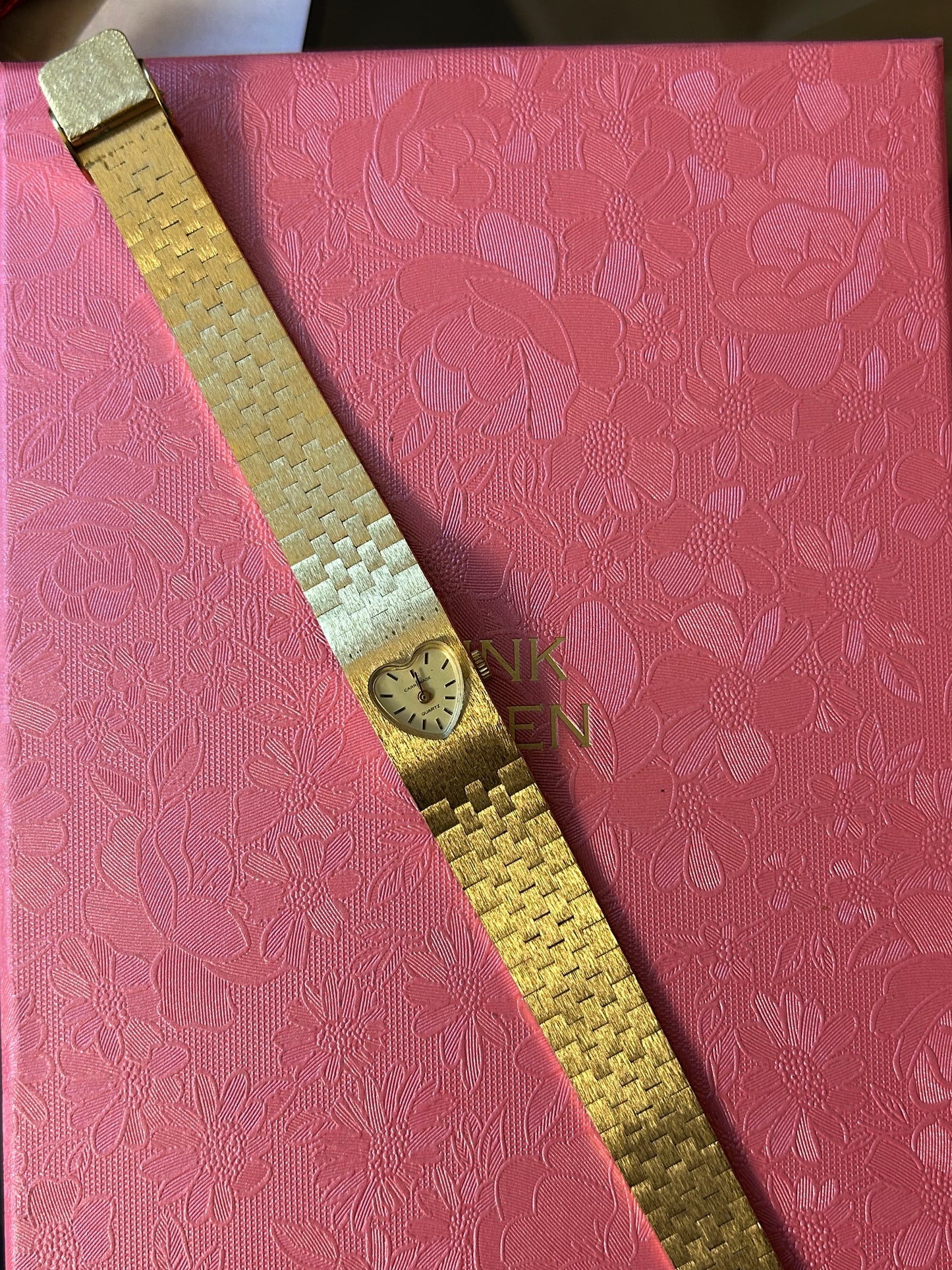 Gold heart watch