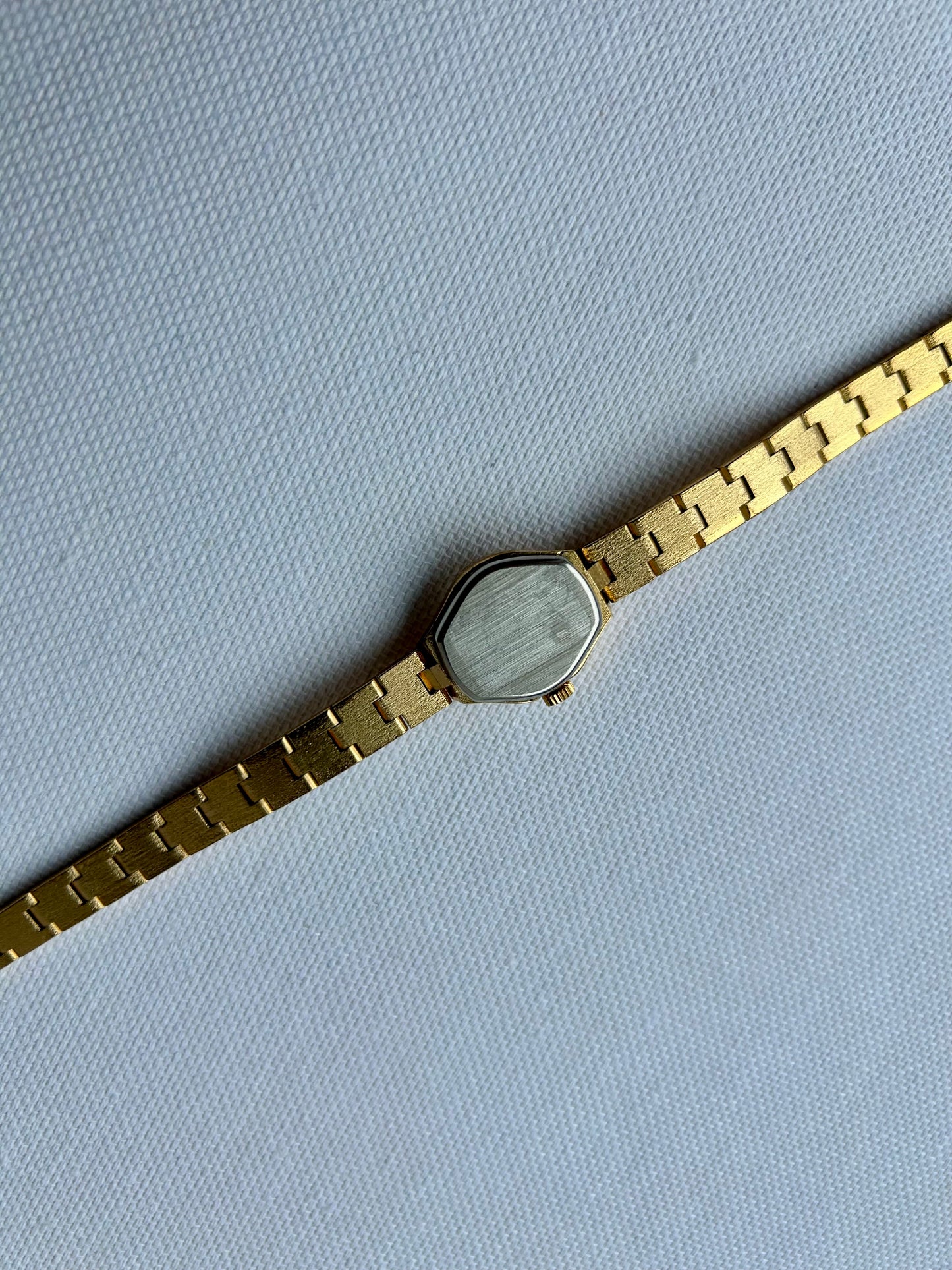 Gold tone watch