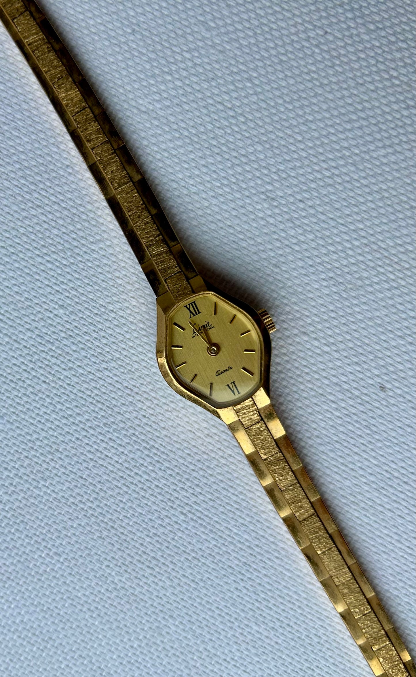 Gold tone watch